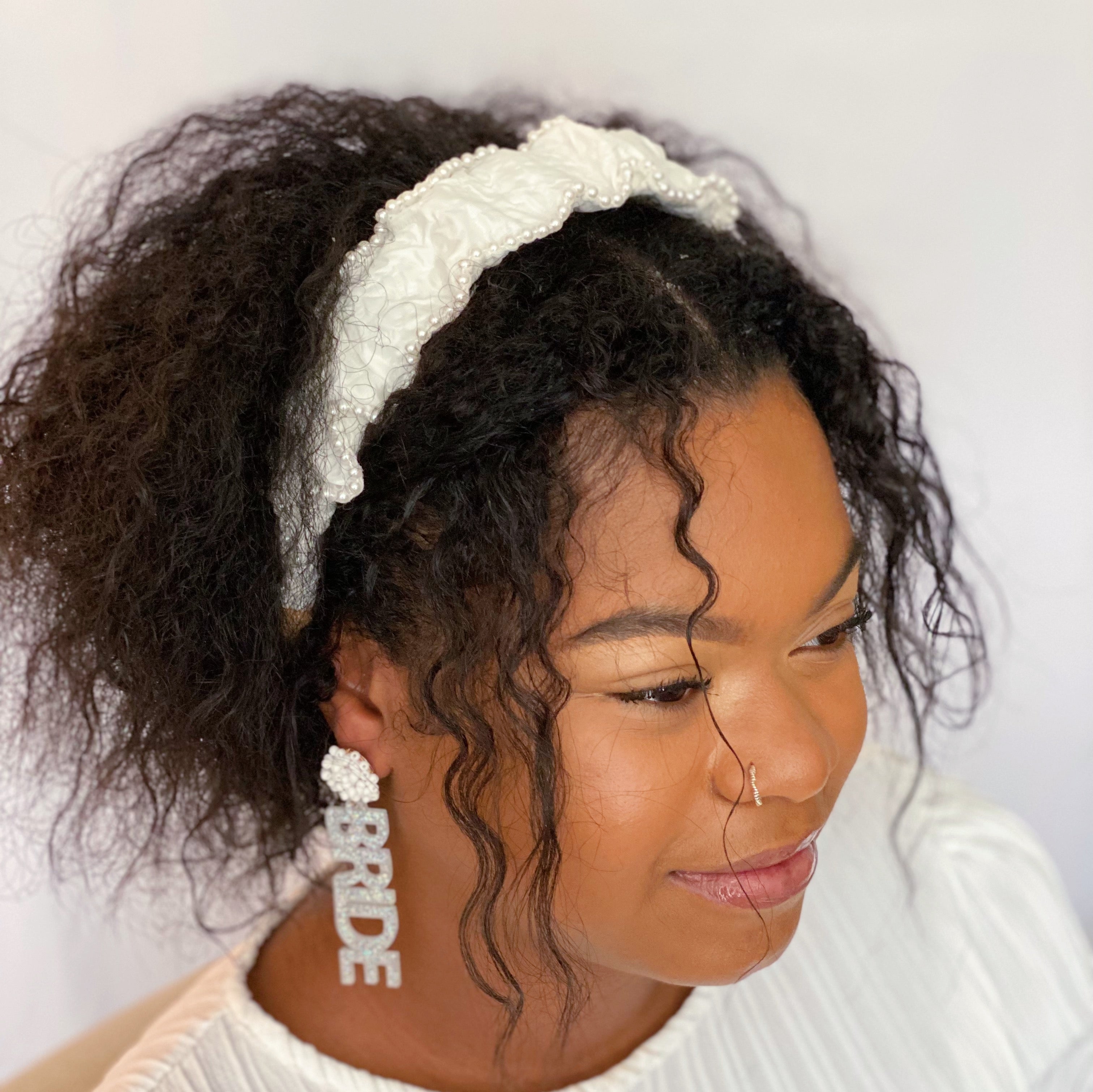 Elevate Your Style with the Elegant Pearl-Embellished Headband by Palace