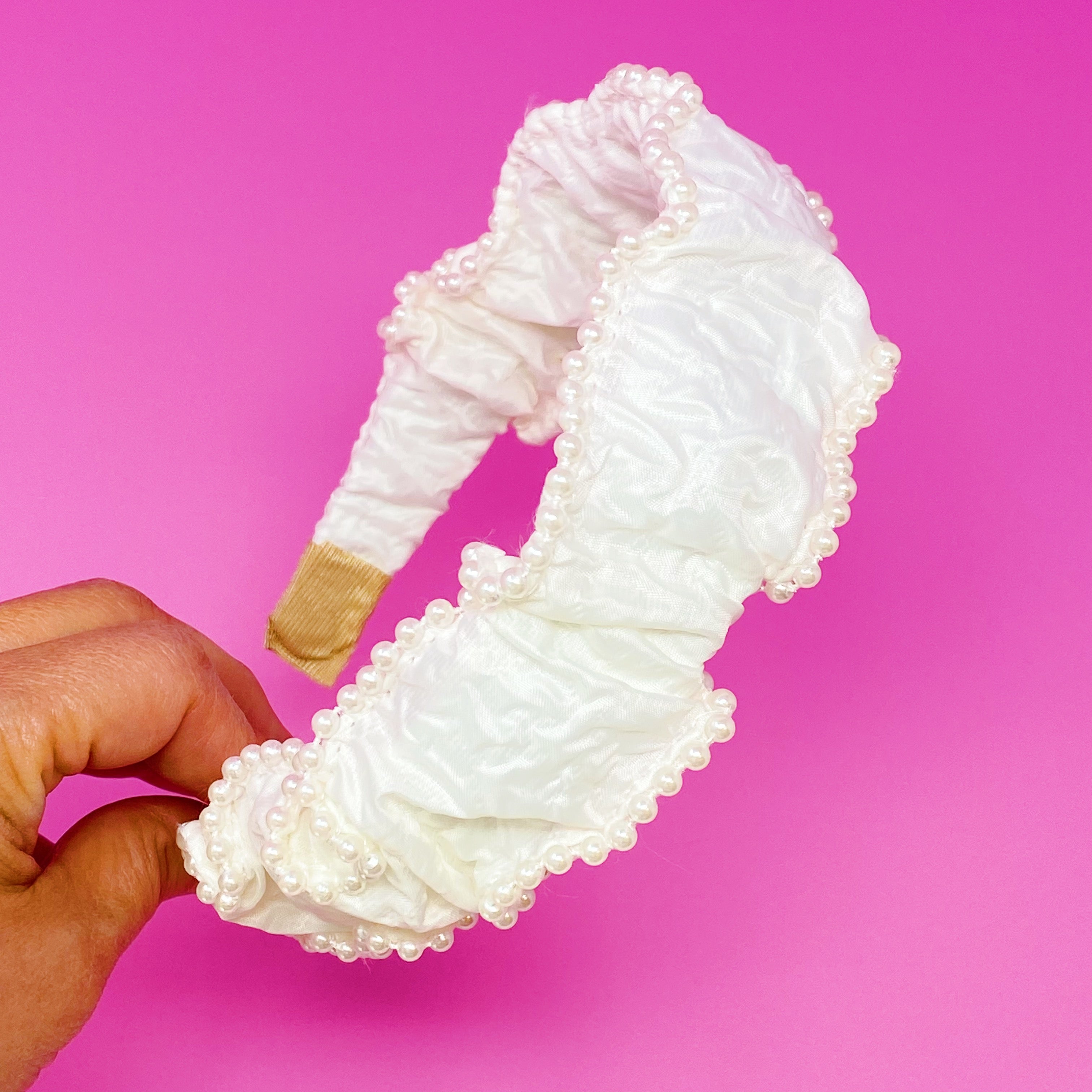 Elevate Your Style with the Elegant Pearl-Embellished Headband by Palace